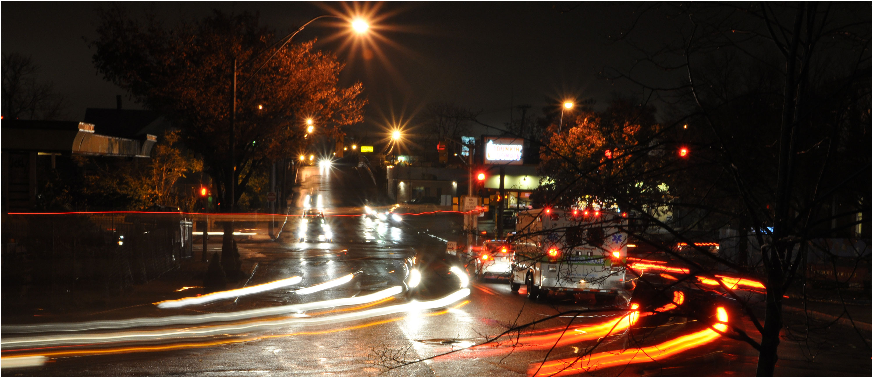 image taken at night of Union Square, Somerville, MA